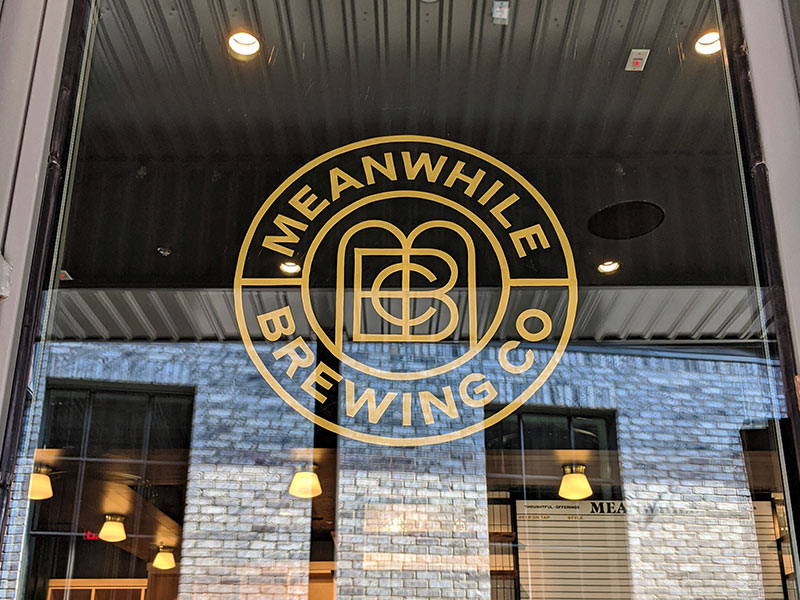 1 meanwhile brewing co window sign austin tx