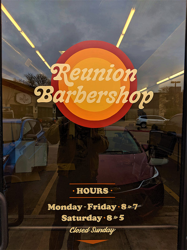 reunion barbershop window sign austin tx